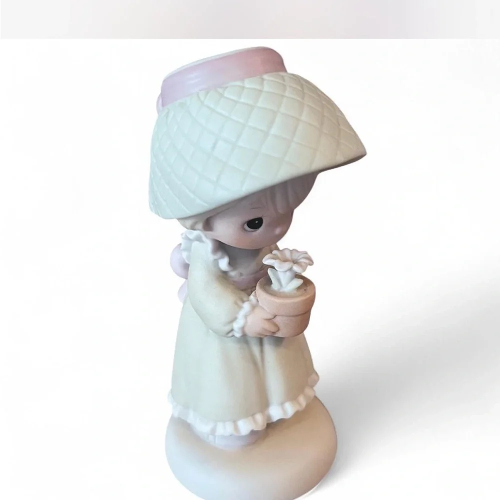 Precious Moments Figurine ‘His Love Will Shine on You’ in excellent condition